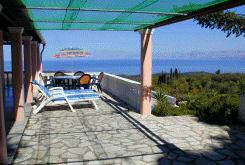 Large terraces around the villa for sunbathing or shaded dining.